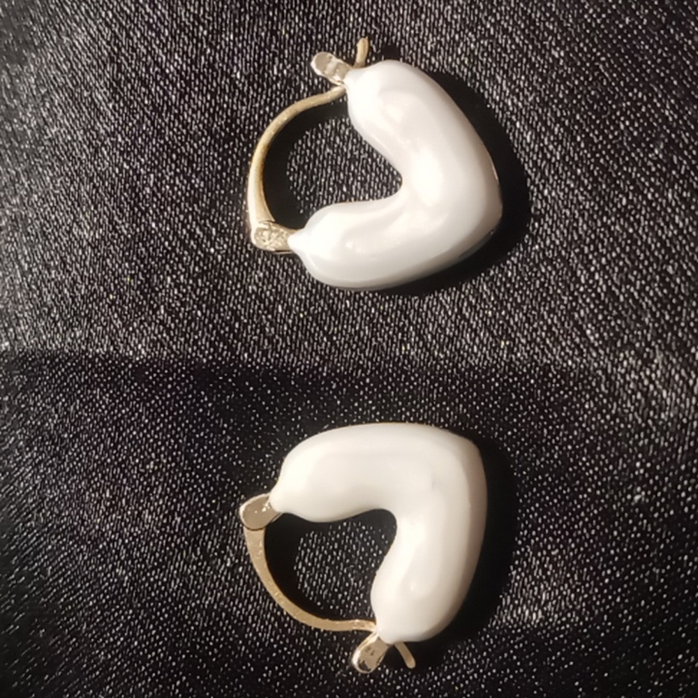 Heart shaped snuggie earrings sterling silver with gold wash.
